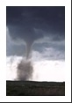 The dirt column shows signs of vortex breakdown after five or ten minutes but this tornado lasted fifteen or more minutes before dissipating.