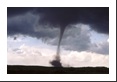 The warning sirens blared in Lamar as this tornado approaches the town.  We viewed it from the east on the southern outskirt of town about two miles from the touchdown location.