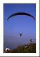 Lifting off from the flower-covered hillside on Le Puy de Dome.