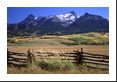 Mt. Sneffels (14,150), beautiful meadow, and rustic fence.