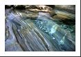 Amazing striations on rocks in this stream and glass-like water - the clearest water I ever saw.