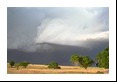 Open farm country stretches out before this LP supercell with a UFO shape.