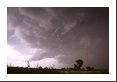 Two funnels drop out of this cloud - at least one is a tornado with a brief dust/debris cloud at the ground - on a rare Colorado August tornado chase.